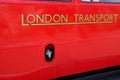 London transport vintage double decker bus text sign and brand logo on panel side