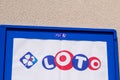 loto and fdj La FranÃÂ§aise des Jeux french lottery operator sign brand on store with