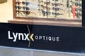 Lynx optique logo and text shop sign store french brand Optician glasses