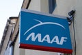 MAAF sign and text logo front of office store assurances on agency wall