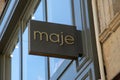 Maje logo brand boutique wall and text sign entrance clothing store French fashion