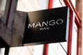 Mango man logo and text sign Spanish clothing store shop front
