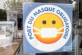Masque obligatoire france anti covid-19 french text means in english store anti-covid