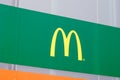 McDonald m yellow logo sign on green of fastfood american mcdonald`s restaurant