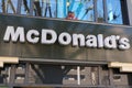 McDonald`s sign text and brand logo on Restaurant Exterior of McDonalds fast food