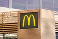McDonald`s sign text and brand logo on Restaurant Exterior of McDonalds fast food