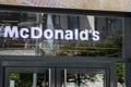 McDonald\'s sign text and brand logo on windows facade Restaurant Exterior of McDonald