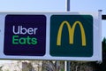 McDonald`s and uber eat sign logo and text brand for delivery Restaurant of McDonalds