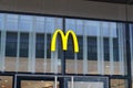 McDonald sign m text yellow logo brand on Restaurant Exterior of McDonalds fastfood