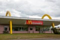 McDonald sign text yellow logo brand on facade Restaurant Exterior of McDonalds Royalty Free Stock Photo