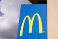 McDonalds logo m yellow sign brand of global chain of fastfood restaurant Royalty Free Stock Photo