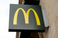 McDonalds logo m yellow sign of global chain of fastfood restaurant store Royalty Free Stock Photo