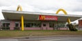 McDonalds sign brand m logo text on Restaurant Exterior of McDonalds fast food wall Royalty Free Stock Photo