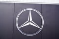 Mercedes benz logo brand dealership sign text on wall store German automotive Daimler