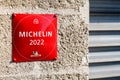 Michelin 2022 red guide star book plate text sign with logo brand on wall good