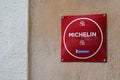 Michelin Star book Guide plate text sign with logo brand on good Restaurant Wall Royalty Free Stock Photo