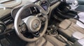 Mini Cooper steering wheel and dashboard detail modern car interior design Royalty Free Stock Photo