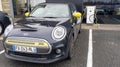 Mini E new electric car vehicle modern charging point hybrid