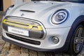 Mini Electric e logo brand and sign front of ev car vehicle modern hybrid