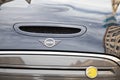 Mini Electric e logo brand and text sign on car front of modern ev vehicle