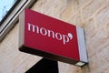 Monop logo brand and sign text of French retail chain stores combine food clothes