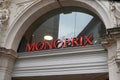 Monoprix logo brand and text sign building supermarket facade entrance street