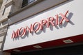 Monoprix logo sign shop supermarket store wall facade text brand city market