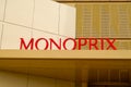 Monoprix logo text and brand sign shop supermarket store facade in street