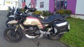 Moto Guzzi v85 tt new retro motorcycle front of bike dealer motorbike seller shop of