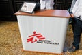 MSF logo sign welcome stand and presentation for Medecins Sans Frontieres french