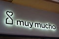 Muy mucho logo brand and text sign of store of home decoration design shop