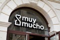 Muy mucho logo and text sign of spanish chain store of home decoration design shop