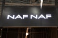 naf naf boutique brand logo and sign text on wall shop facade entrance fashion front