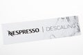 Nespresso box descaling text brand and logo sign for clean machine coffee doses