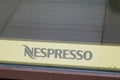 Nespresso logo sign and text brand of coffee machines front facade shop on store Royalty Free Stock Photo