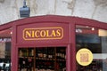 Nicolas logo brand and text sign facade entrance wall shop of French wine alcohol