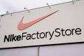 Nike factory store logo brand and text sign of American shop multinational corporation