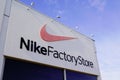 Nike Factory Store text sign and logo of discount sport clothing fashion and footwear