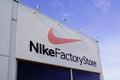 Nike factory store text sign and logo front of sportswear shop supplier of athletic