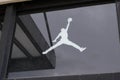 Nike logo brand and basket air sign on windows facade store of American shop us