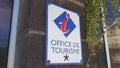 Office de tourisme in france sign and logo text of French tourism wall agency to help