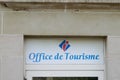 Office de tourisme logo and text sign on tourism agency building in French language