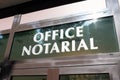 Office notarial french Notaire means notary text on windows agency sign logo on