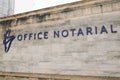 Office notarial notaire france symbol of notary office french text logo sign on wall