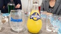 Orangina orange lemonade logo sign and brand text on bootle with empty soda glass