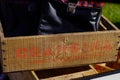 Orangina orange lemonade logo sign and brand text on old wooden crate