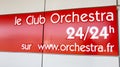 Orchestra child fashion store sign red logo and text web site internet sell children