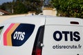 Otis Elevator Company logo brand and text sign on service panel van