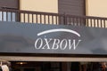 Oxbow surf sign store logo and text brand facade wall building shop Royalty Free Stock Photo