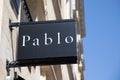 pablo sign text and logo brand on wall facade entrance on fashion clothes